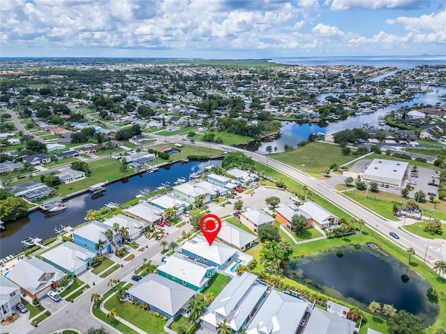 aerial view featuring a water view and a residential view