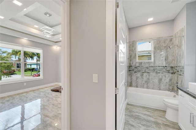 full bathroom with shower / bathtub combination, toilet, vanity, baseboards, and a raised ceiling