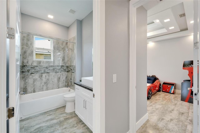 ensuite bathroom with visible vents, vanity, toilet, and ensuite bathroom