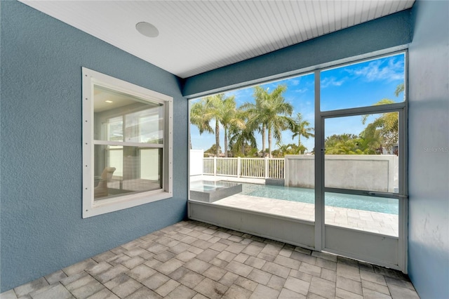 view of unfurnished sunroom