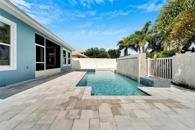 view of swimming pool with a fenced backyard, a fenced in pool, and a patio