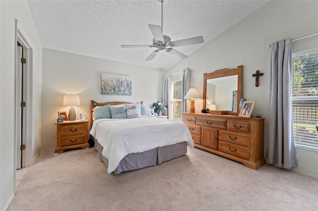 bedroom featuring light carpet, multiple windows, and lofted ceiling