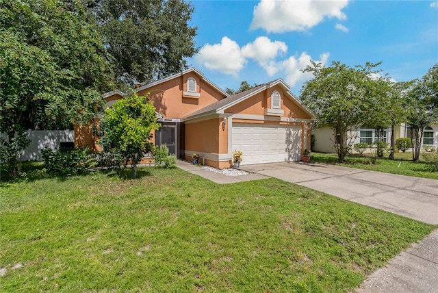 view of front of property featuring a garage and a front lawn