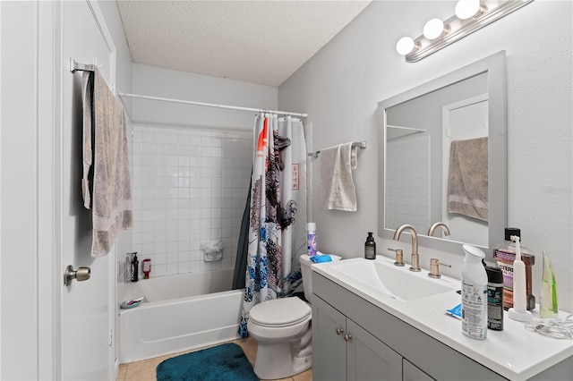 full bathroom featuring a textured ceiling, toilet, vanity, tile patterned floors, and shower / bathtub combination with curtain