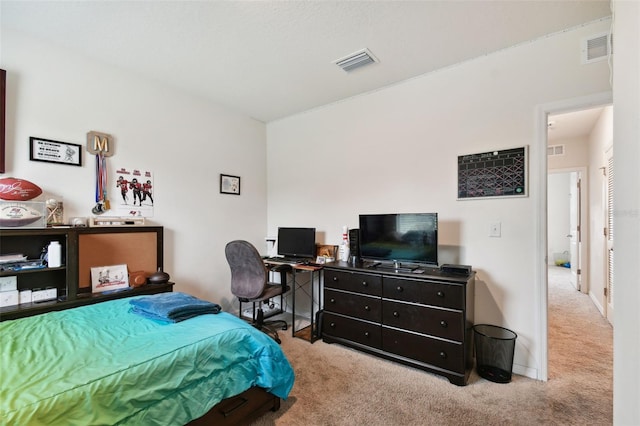 bedroom featuring visible vents, carpet flooring, and baseboards