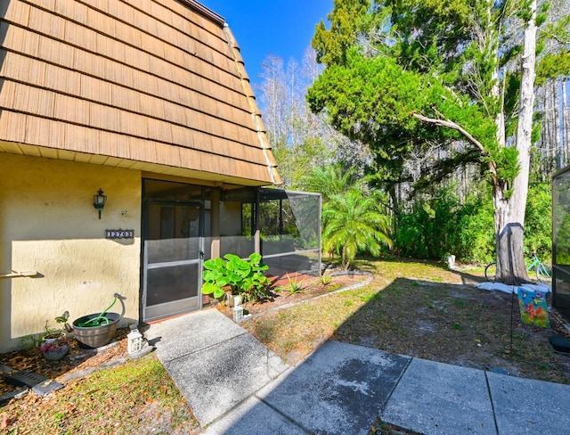 view of yard with a lanai