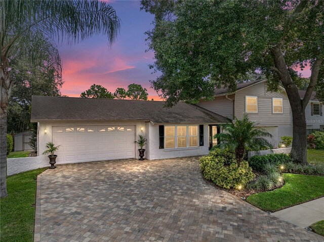 view of front of property with a garage