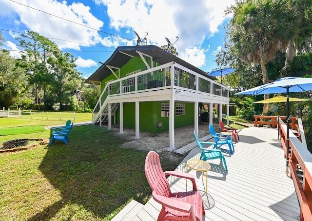 exterior space with a wooden deck and a yard