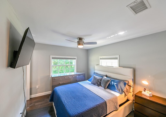 4617 John Moore Rd, Brandon, FL 33511 - bedroom featuring dark wood finished floors, baseboards, and a ceiling fan