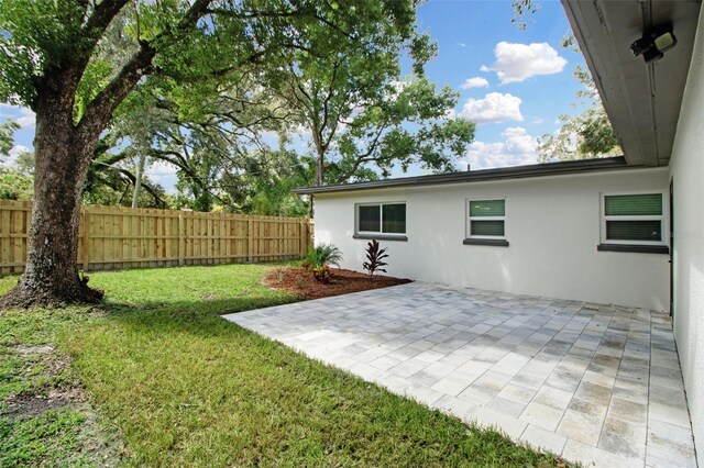 view of yard with a patio area