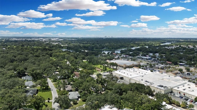 bird's eye view featuring a water view and a view of trees