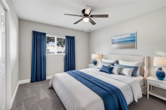 bedroom with carpet floors, a ceiling fan, and baseboards