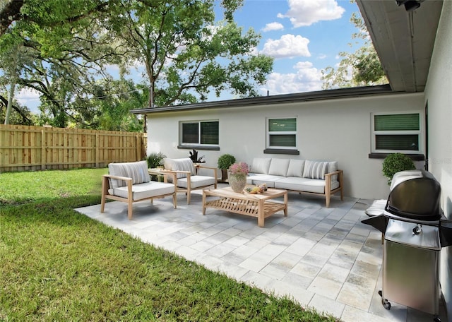 view of patio with a grill and an outdoor hangout area