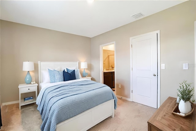 bedroom with light carpet, baseboards, and visible vents