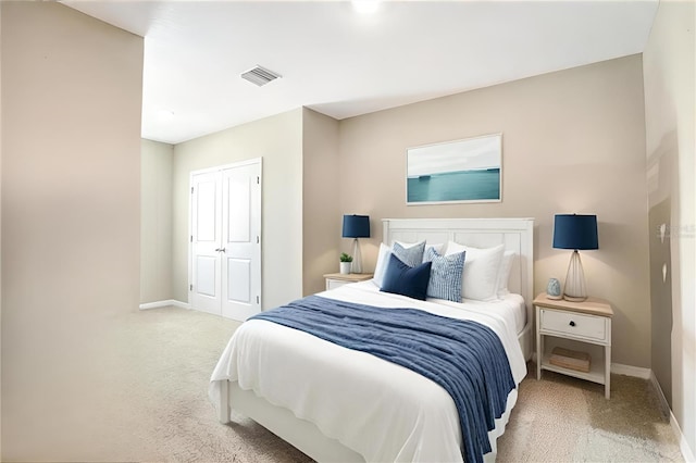 bedroom featuring carpet, visible vents, and baseboards