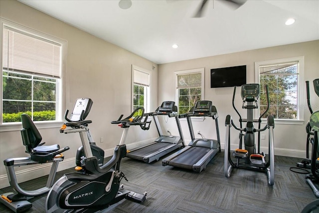 exercise room with carpet floors, recessed lighting, and baseboards