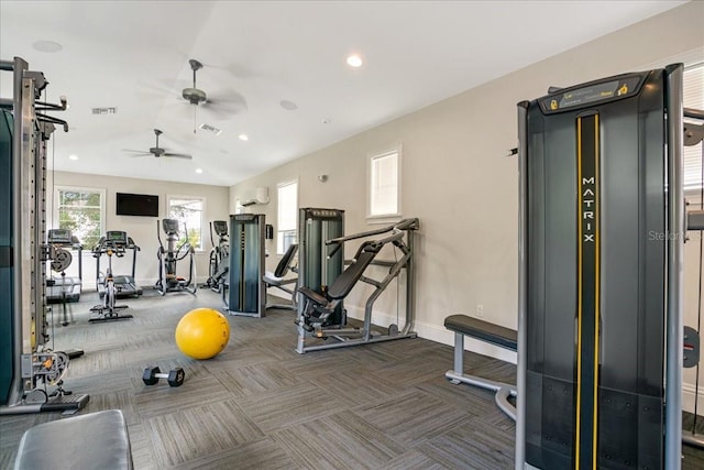 workout area with visible vents, baseboards, dark colored carpet, an AC wall unit, and recessed lighting