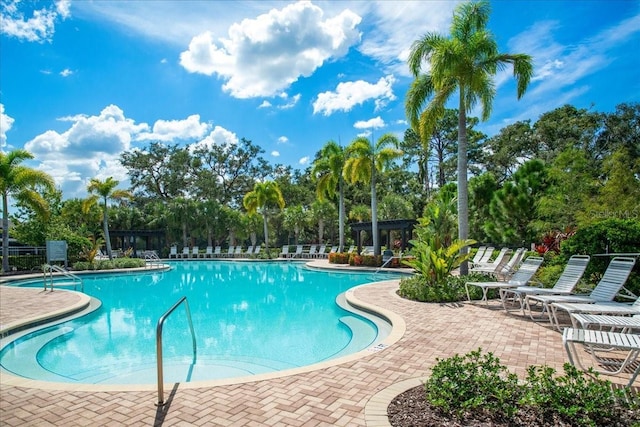 community pool with a patio