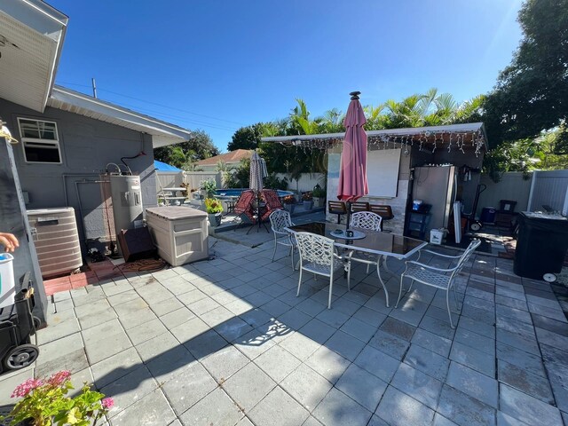 view of patio featuring central air condition unit