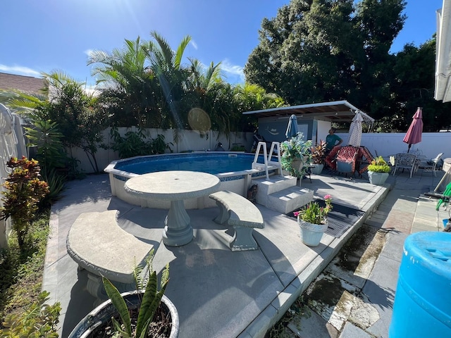 view of swimming pool featuring a patio and a pergola