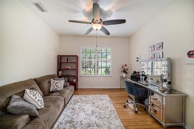 office area featuring light hardwood / wood-style flooring and ceiling fan