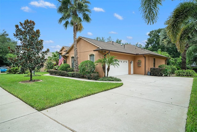 ranch-style home with a front lawn and a garage