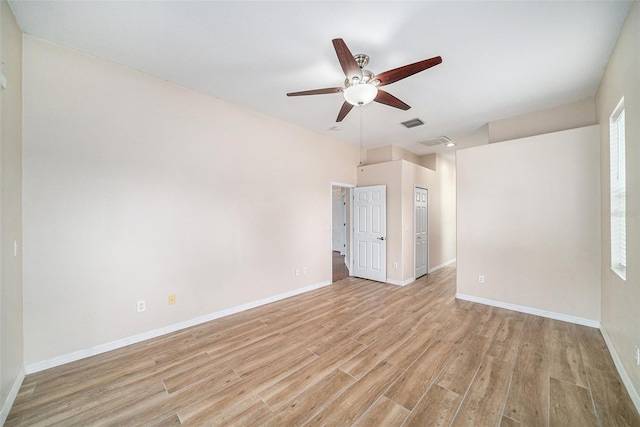 unfurnished bedroom with light hardwood / wood-style flooring and ceiling fan