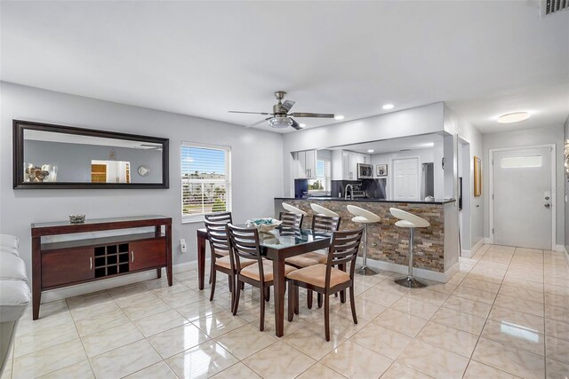 1819 Shore Dr S Unit 318, South Pasadena, FL 33707 - dining room with ceiling fan, baseboards, light tile patterned floors, and recessed lighting