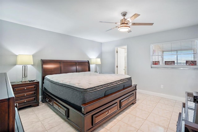 bedroom with ceiling fan and light tile patterned floors