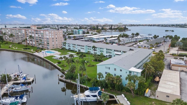 birds eye view of property with a water view