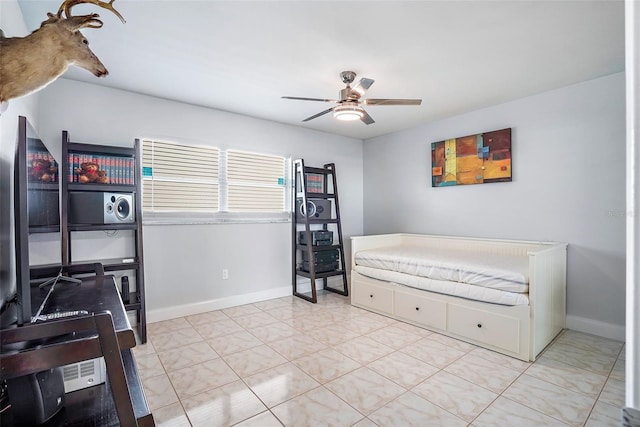 1819 Shore Dr S Unit 318, South Pasadena, FL 33707 - bedroom featuring baseboards and ceiling fan