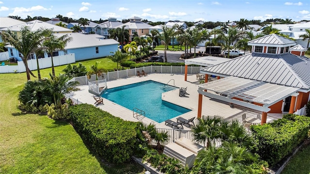 view of swimming pool featuring a yard, a pergola, and a patio area