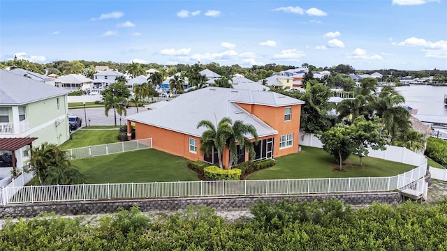 drone / aerial view featuring a water view