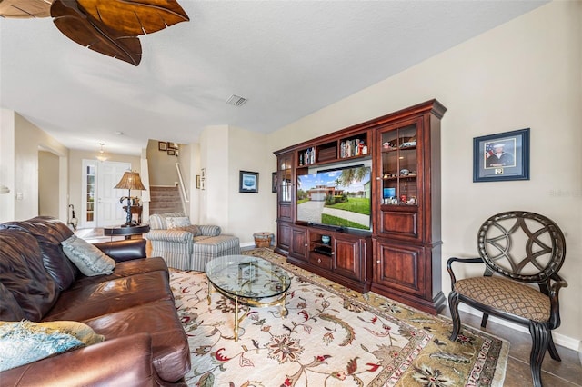 living room featuring a textured ceiling