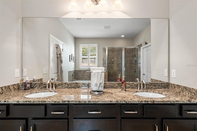 bathroom featuring vanity and walk in shower