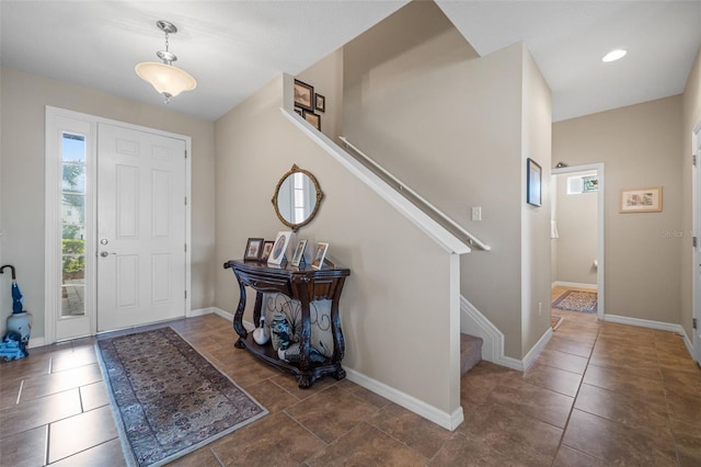 foyer entrance with plenty of natural light