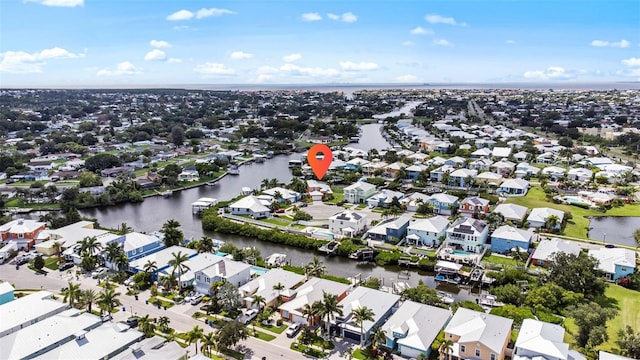 drone / aerial view featuring a water view