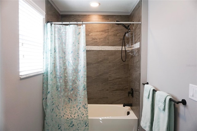 bathroom featuring radiator and shower / bathtub combination with curtain