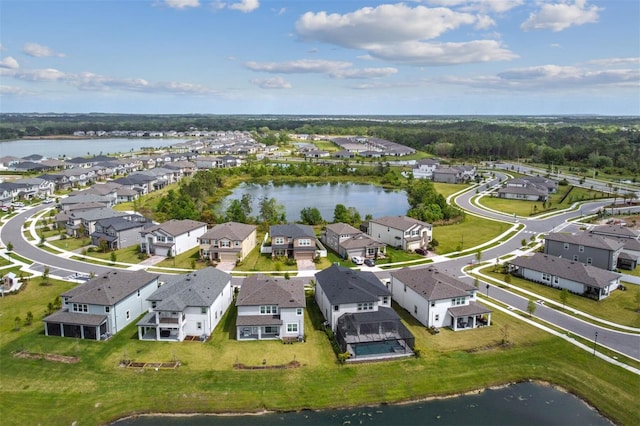 aerial view with a residential view and a water view