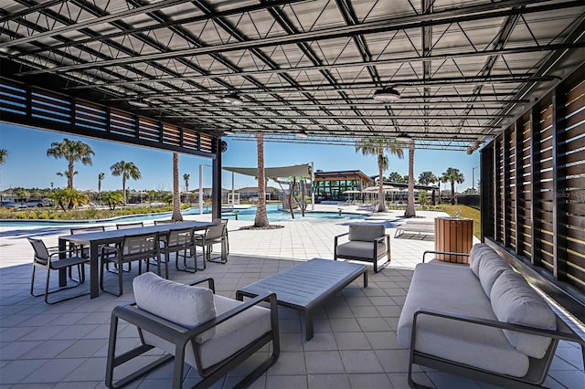 view of patio / terrace featuring an outdoor living space and a community pool