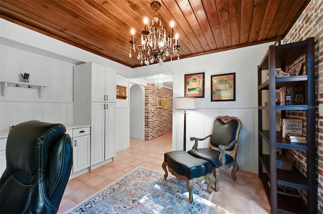 office with wooden ceiling, arched walkways, an inviting chandelier, and wainscoting