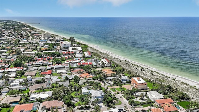 bird's eye view with a water view and a view of the beach