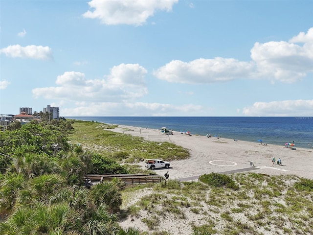 view of water feature with a beach view
