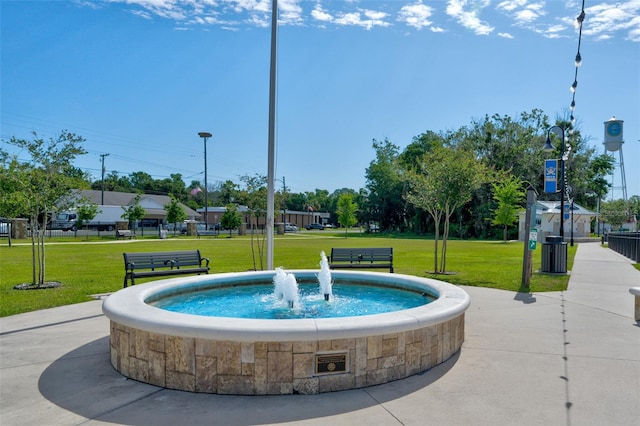 view of home's community featuring a yard