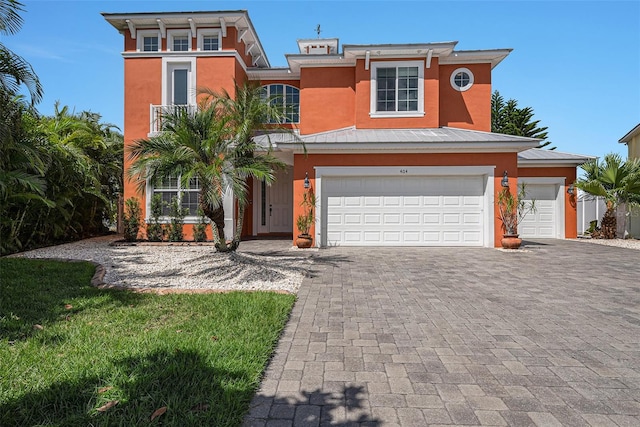 view of front of property featuring a garage