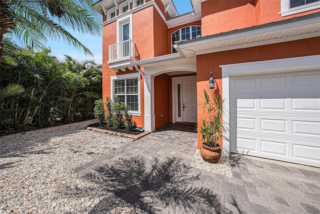 entrance to property featuring a garage