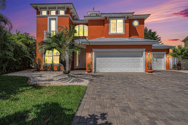 view of front of property featuring a garage