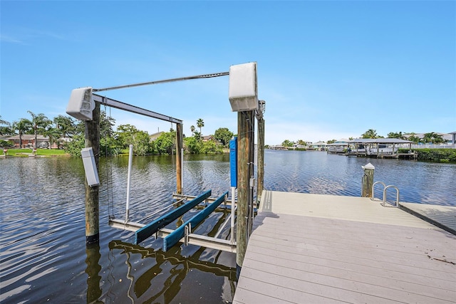 dock area featuring a water view