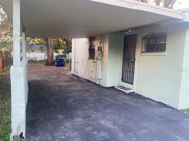 view of patio / terrace featuring a carport