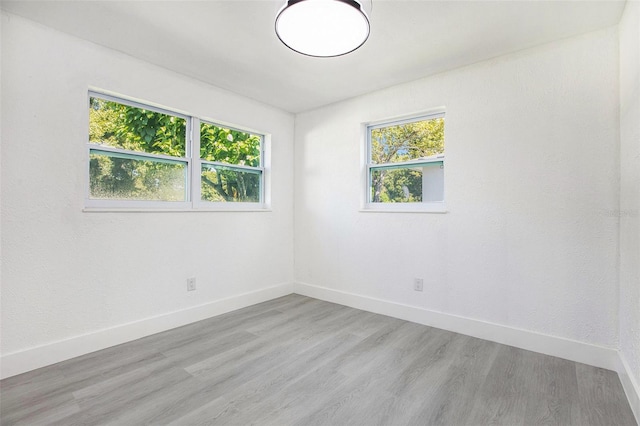 empty room featuring hardwood / wood-style floors